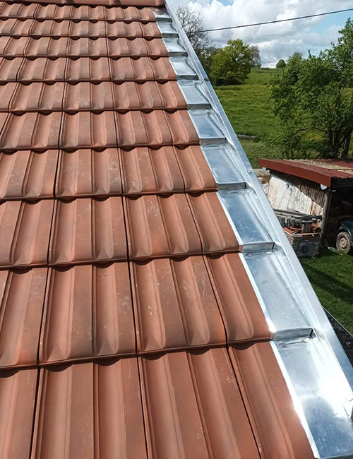 Experts en Travaux de Zinguerie : Installation et Réparation de Gouttières, Lucarnes et Plus en Moselle (57)